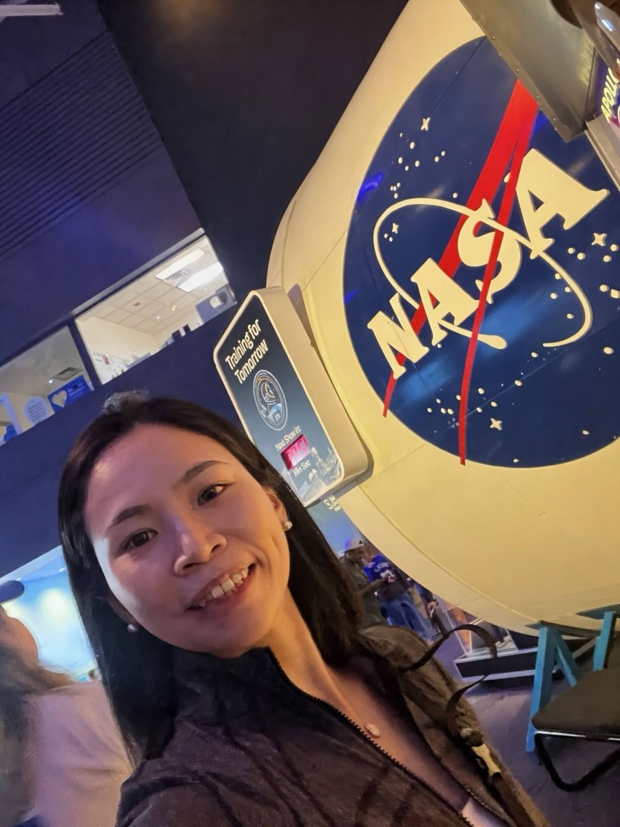 Spring in front of a NASA logo