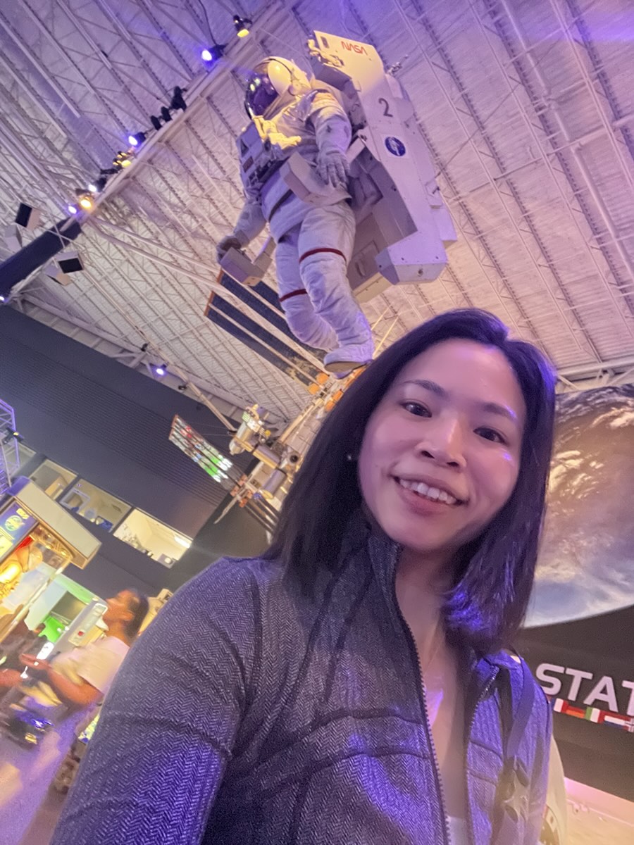 Spring under a model astronaut hanging from the ceiling